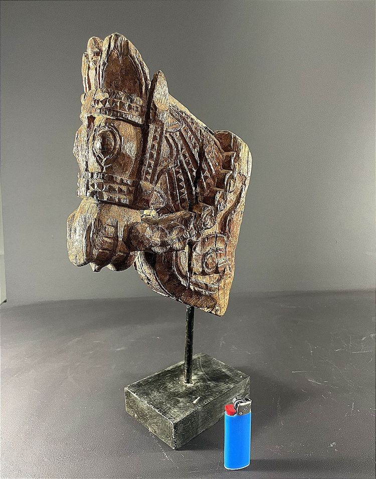 India, 19th century, Votive sculpture in the form of a harnessed horse's head.