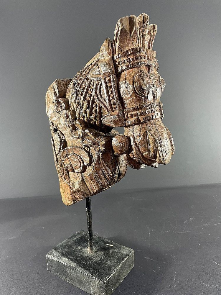 India, 19th century, Votive sculpture in the form of a harnessed horse's head.