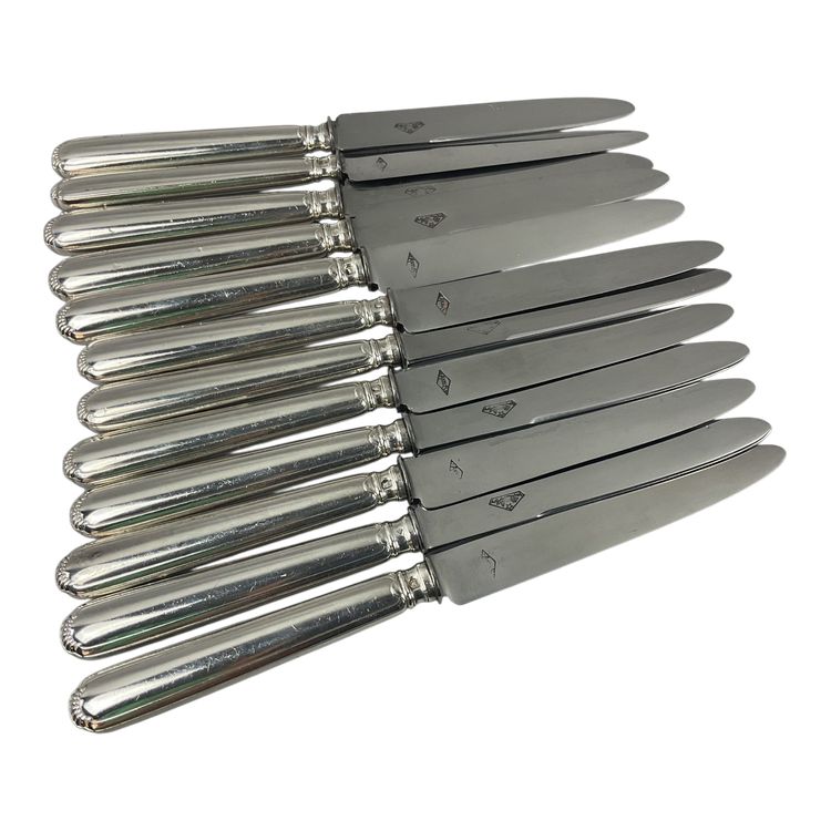12 Käsemesser mit Silbergriff, Klingen aus rostfreiem Stahl