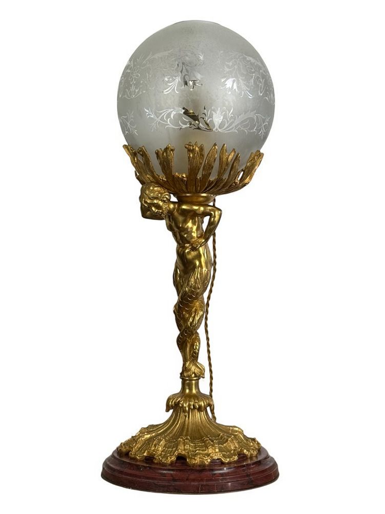 LAMPADA DEL XIX SECOLO IN BRONZO DORATO CHE RAPPRESENTA UN TRITONE CON BASE IN MARMO A DOPPIA CODA