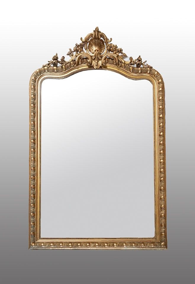 Antico specchio Napoleone III in legno dorato e intagliato. XIX secolo.