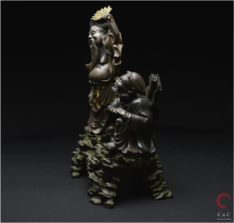 China, Qing Dynasty, 19th century, Polychrome lacquered wood group representing two Immortals