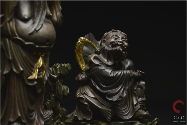 China, Qing Dynasty, 19th century, Polychrome lacquered wood group representing two Immortals