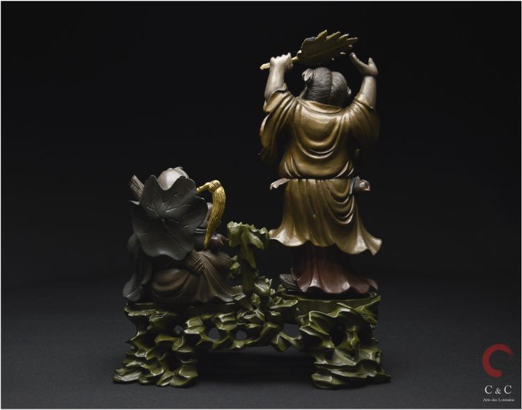 China, Qing Dynasty, 19th century, Polychrome lacquered wood group representing two Immortals
