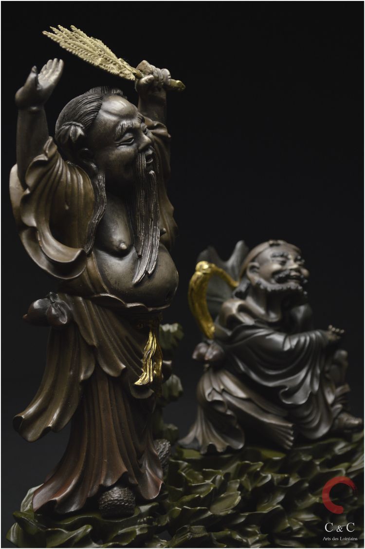 China, Qing Dynasty, 19th century, Polychrome lacquered wood group representing two Immortals