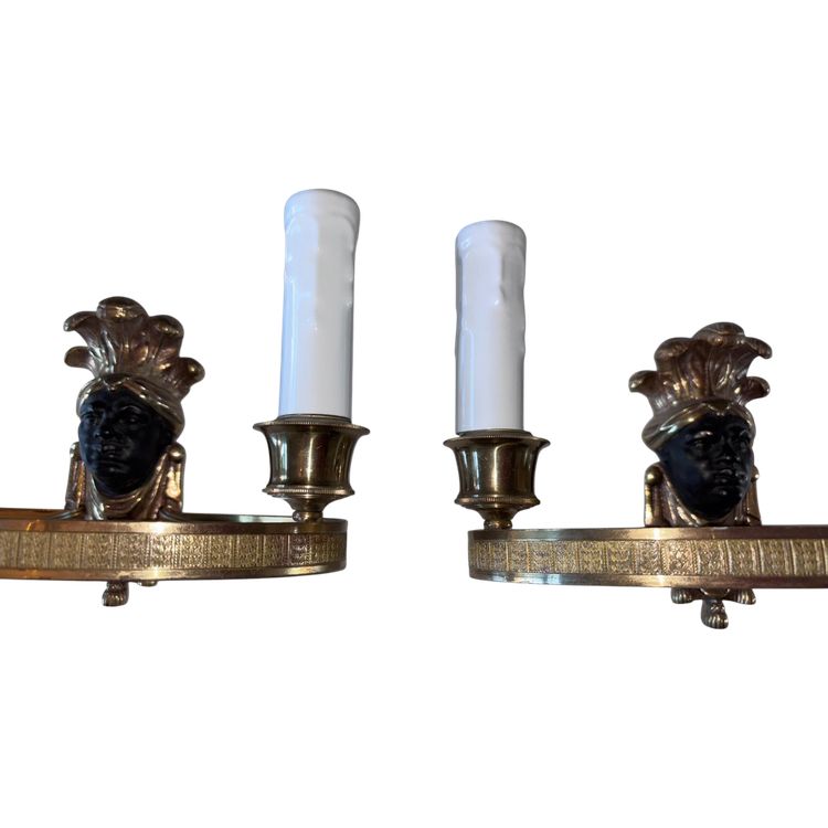 Maison BAGUES, Aux Indiens wall lights in gilded and patinated bronze