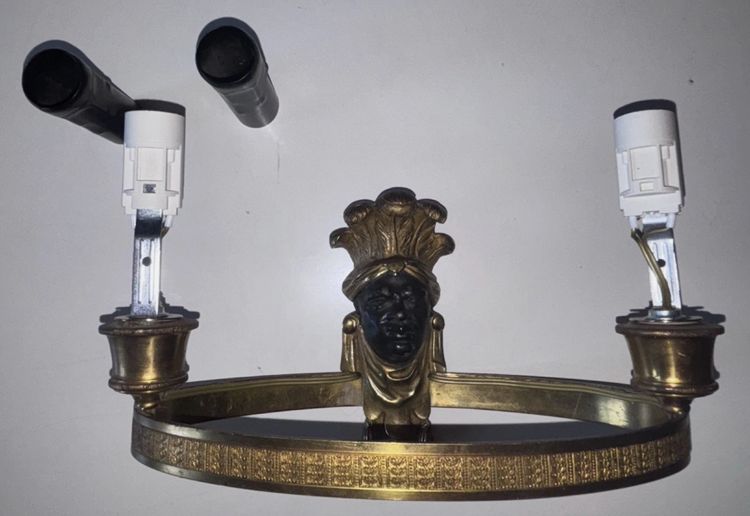 Maison BAGUES, Aux Indiens wall lights in gilded and patinated bronze