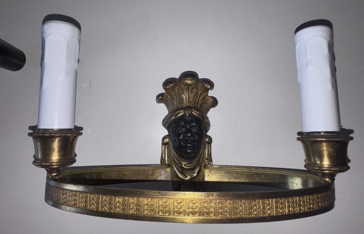 Maison BAGUES, Aux Indiens wall lights in gilded and patinated bronze