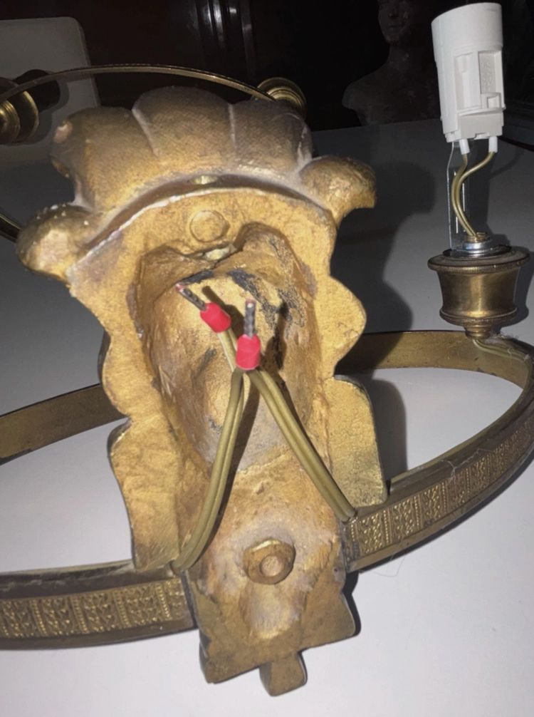 Maison BAGUES, Aux Indiens wall lights in gilded and patinated bronze
