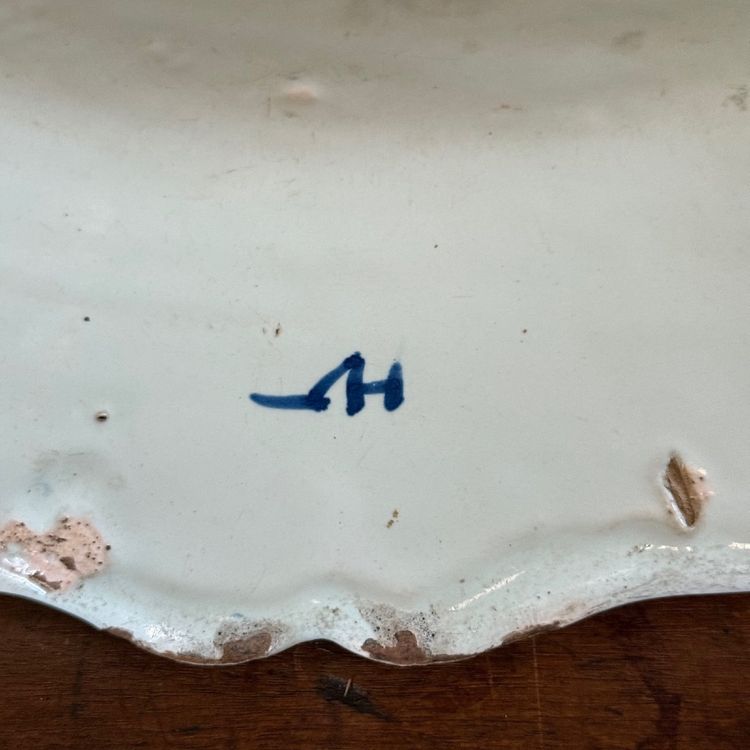 Large dish in Rouen earthenware, polychrome cornucopia 18th century