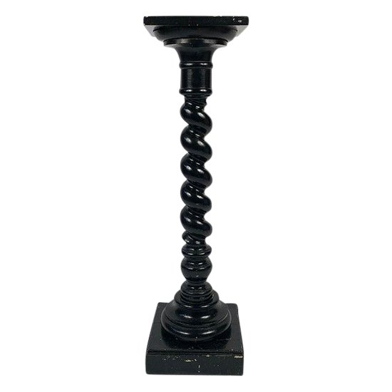 Colonne torse en bois laqué noir