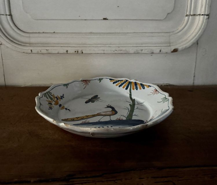 18th century La Rochelle earthenware plate with peacock and butterfly design