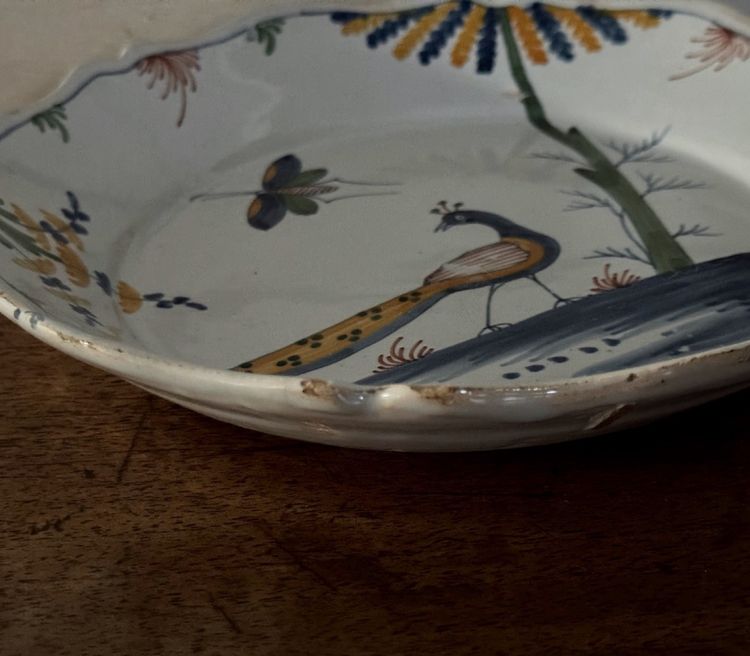 18th century La Rochelle earthenware plate with peacock and butterfly design