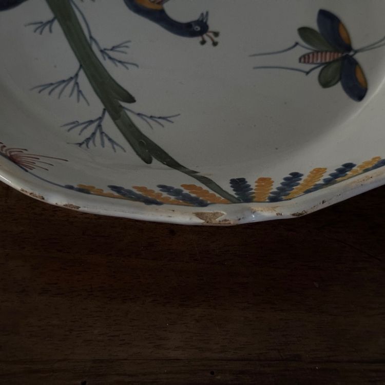 18th century La Rochelle earthenware plate with peacock and butterfly design