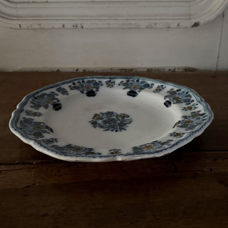 Plate in 18th century Moustiers earthenware with floral design