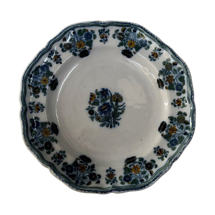 Plate in 18th century Moustiers earthenware with floral design