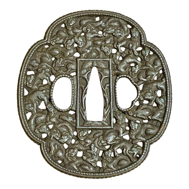 Tsuba mokko gata in ferro traforato e cesellato con decorazione shishi con il suo certificato.NBTHK Hozon