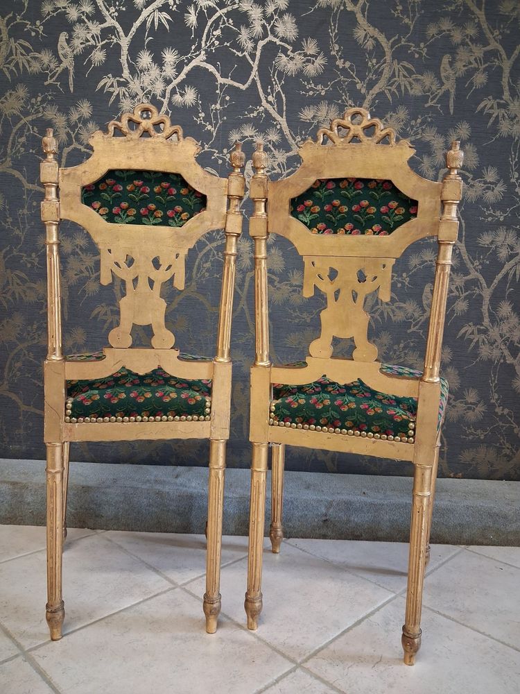 Coppia di sedie in legno dorato stile Luigi XVI XIX