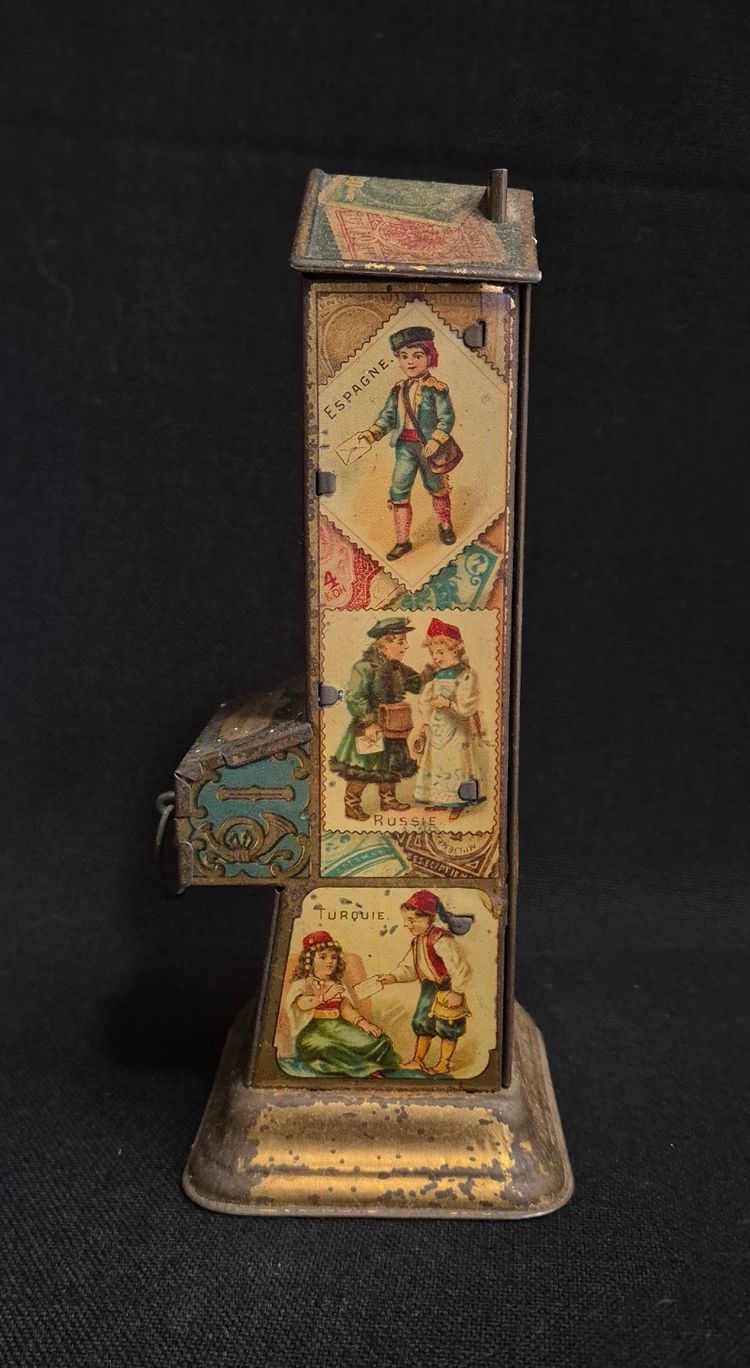 tirelire distributeur de chocolat tôle lithographie
