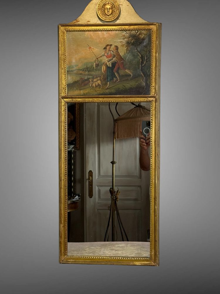19th CENTURY EMPIRE STYLE LAMQUED AND GILDED WOOD TRUMP WITH A SHEPHERD DECORATIVE