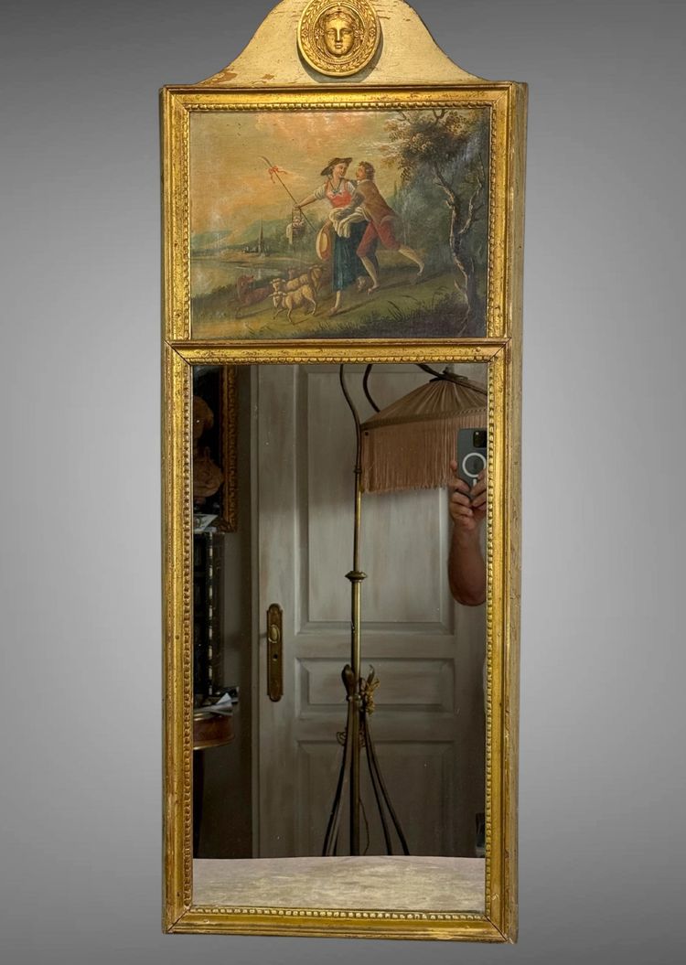 19th CENTURY EMPIRE STYLE LAMQUED AND GILDED WOOD TRUMP WITH A SHEPHERD DECORATIVE