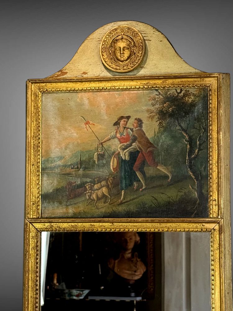 19th CENTURY EMPIRE STYLE LAMQUED AND GILDED WOOD TRUMP WITH A SHEPHERD DECORATIVE