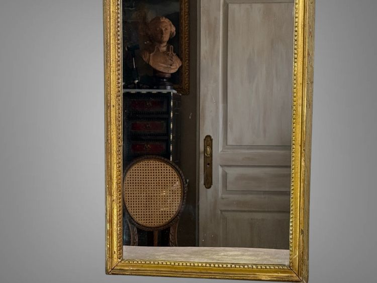 19th CENTURY EMPIRE STYLE LAMQUED AND GILDED WOOD TRUMP WITH A SHEPHERD DECORATIVE