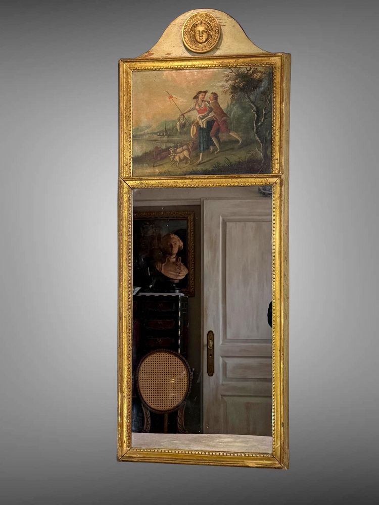 19th CENTURY EMPIRE STYLE LAMQUED AND GILDED WOOD TRUMP WITH A SHEPHERD DECORATIVE