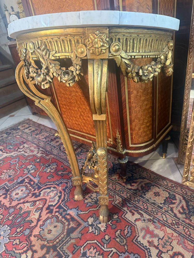 LOUIS XVI STYLE HALF-MOON WALL CONSOLE IN CARVED AND GILT WOOD