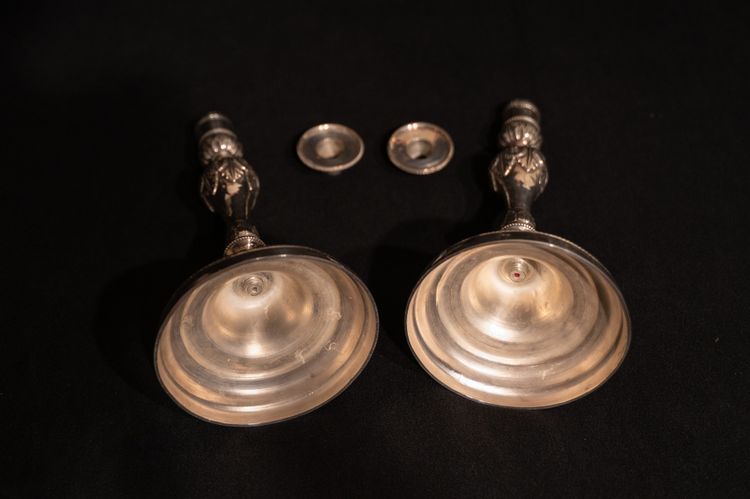 Pair of Louis XVI style silver-plated candlesticks / torches