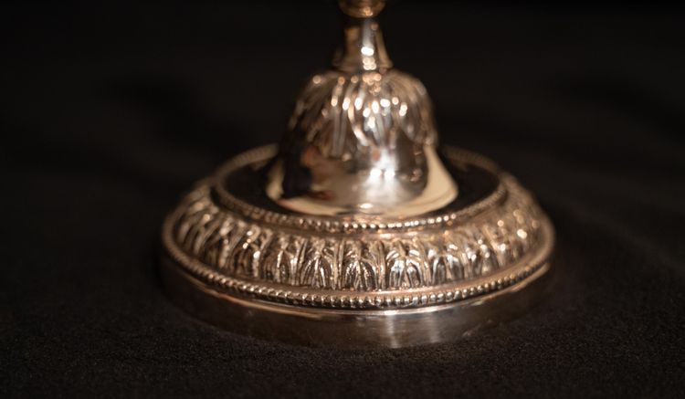 Pair of Louis XVI style silver-plated candlesticks / torches