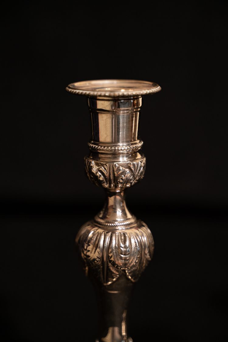 Pair of Louis XVI style silver-plated candlesticks / torches