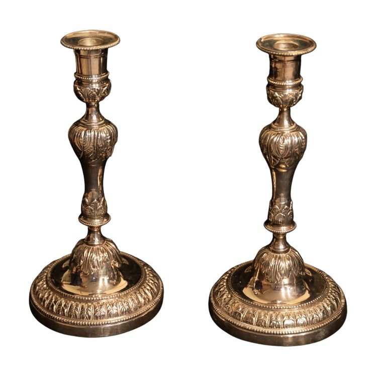 Pair of Louis XVI style silver-plated candlesticks / torches