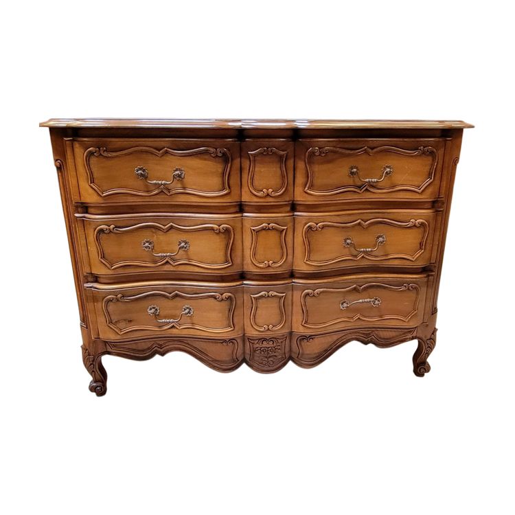Commode arbalète style louis XV estampillée En merisier massif