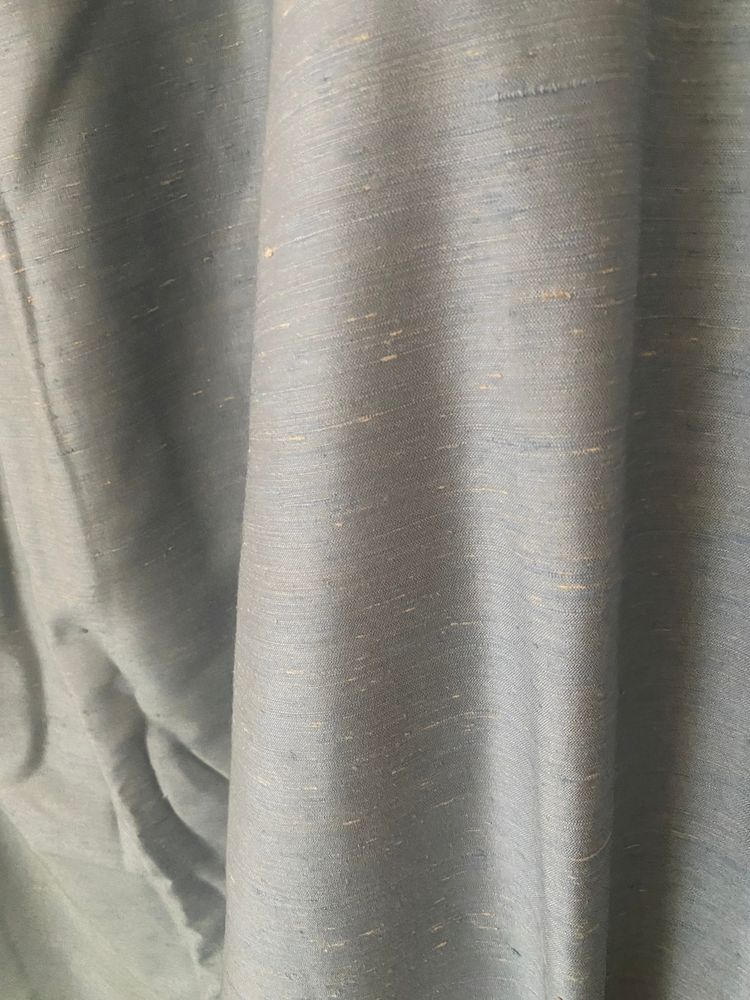 Second pair of sky blue cotton and silk curtains with decorative braces