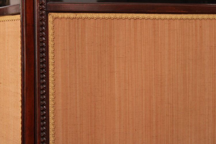 - Louis XVI-style four-leaf folding screen in carved and mahogany-stained beech. Work