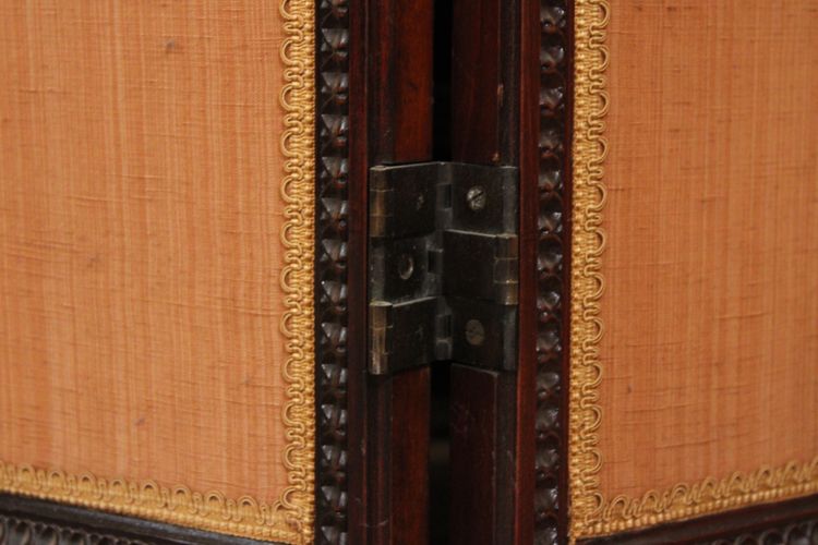- Louis XVI-style four-leaf folding screen in carved and mahogany-stained beech. Work