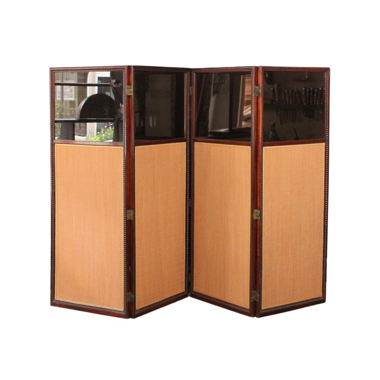 - Louis XVI-style four-leaf folding screen in carved and mahogany-stained beech. Work