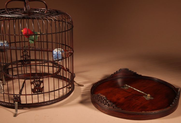 Chinese birdcage in finely carved bamboo.