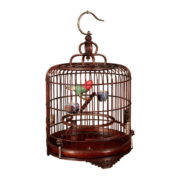 Chinese birdcage in finely carved bamboo.