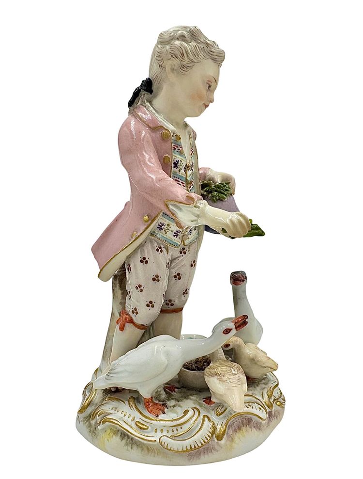 Meissen porcelain figurine Boy feeding geese.