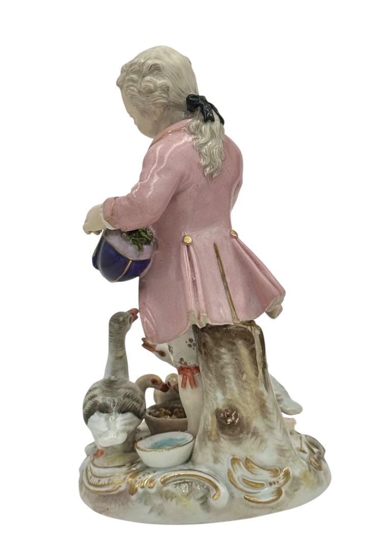 Meissen porcelain figurine Boy feeding geese.