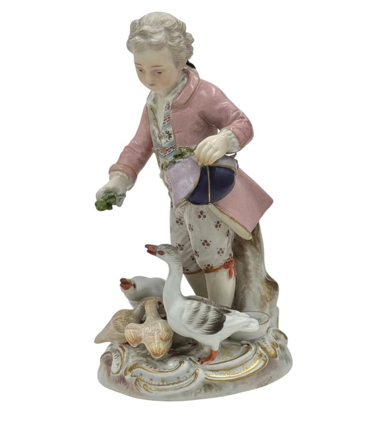 Meissen porcelain figurine Boy feeding geese.