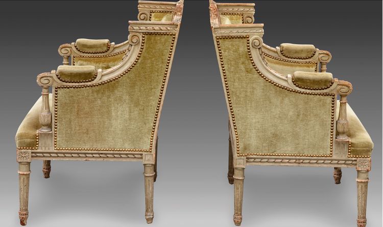 une paire de bergères en bois sculpté, peint gris vert, fin XIXème siècle 