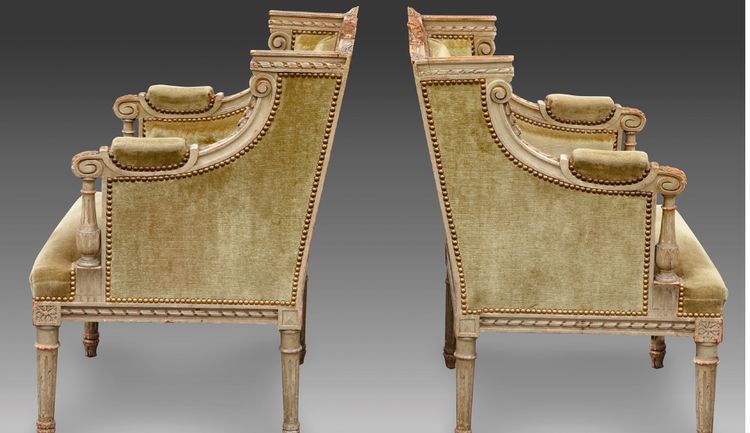 une paire de bergères en bois sculpté, peint gris vert, fin XIXème siècle 