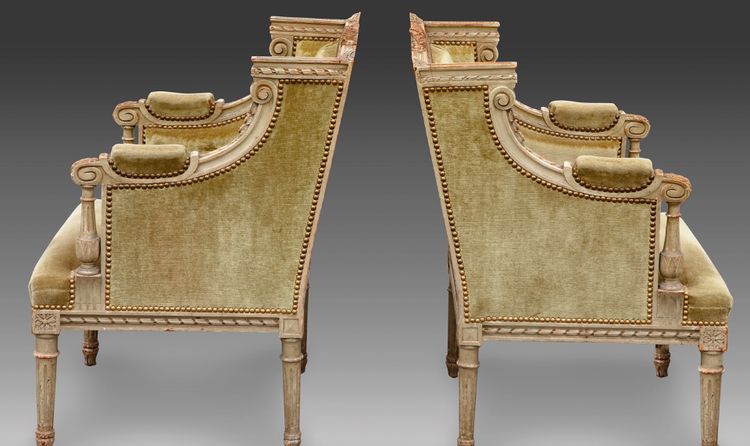 une paire de bergères en bois sculpté, peint gris vert, fin XIXème siècle 