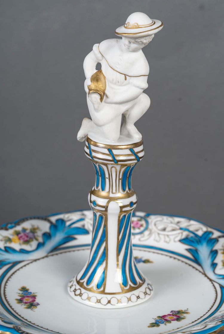 An important pair of porcelain and biscuit centerpieces, late 19th century