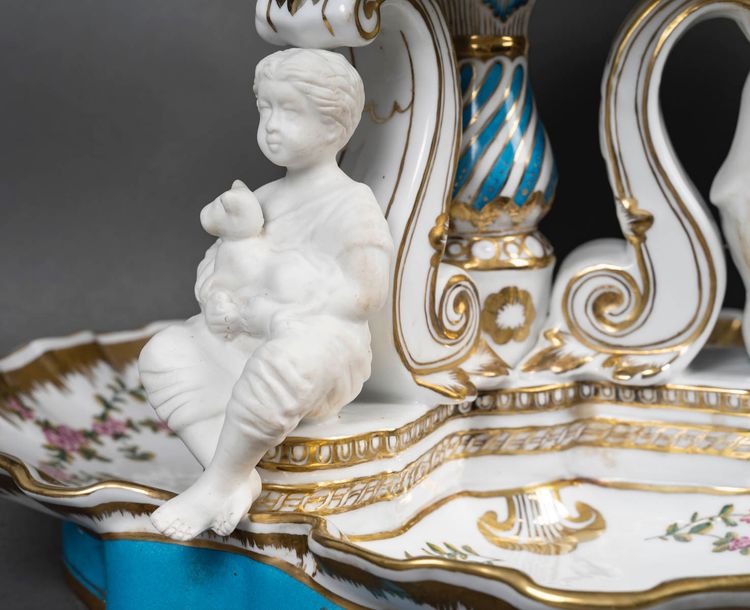 An important pair of porcelain and biscuit centerpieces, late 19th century