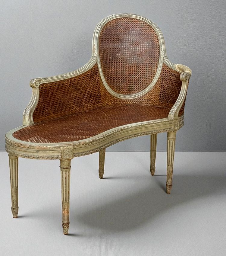 1900S LOUIS XVI STYLE CANED BENCH IN PATINATED WOOD
