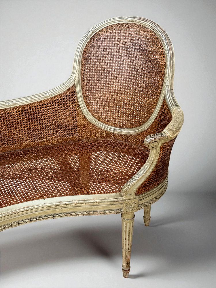 1900S LOUIS XVI STYLE CANED BENCH IN PATINATED WOOD